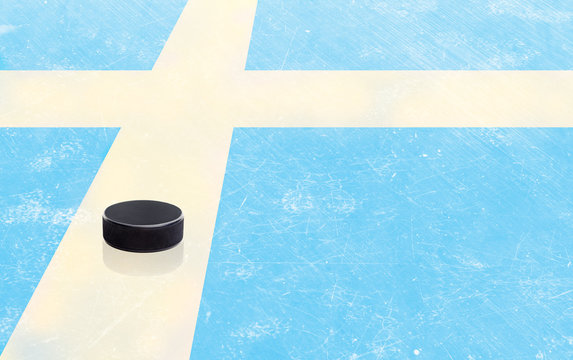 Hockey Puck and Sweden Flag on Ice With Copy Space