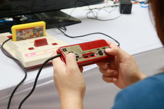  People Playing Old Family Computer Game