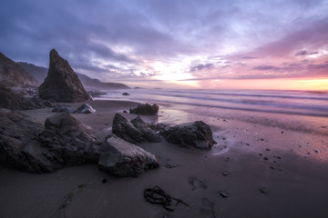 A stunning sunset illuminates Westport Beach on the Mendocino coastline of Northern California.  Westport is just north of Fort Bragg and just south of the Lost Coast.