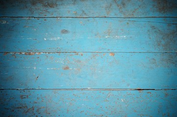 Fototapeta na wymiar Close up texture of blue wooden background