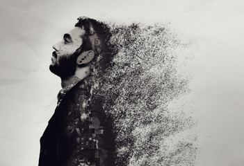 Creative abstract portrait of a guy shattered into pieces