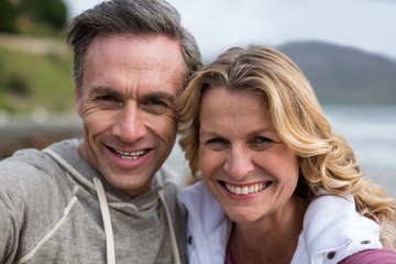 Portrait of mature couple on the beach