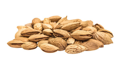 Heap almond nut closeup with shell on white, isolated.