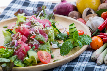 Fresh Salmon Salad with vegetables,healthy salad with mixed lett