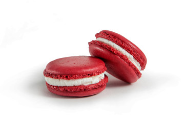 Red macaroons isolated on white