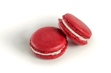Red macaroons isolated on white