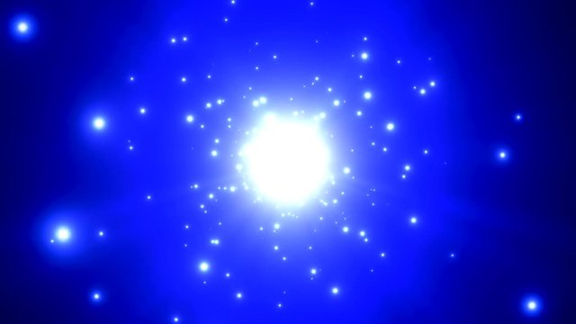 Bright light particles emitted against a blue background..