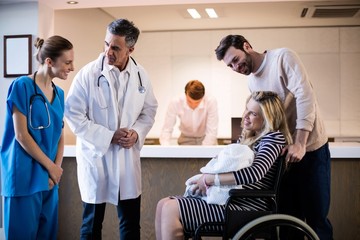 Doctors and patient interacting with each other