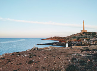 Fototapeta na wymiar Cabo de Palos lighthouse in La Manga. Spain