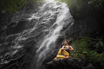 Fototapeta premium serenity and yoga practicing at Phaeng waterfall, koh Phangan island,Thailand