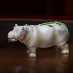 the collector and his hippos in a private collection