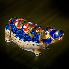 the collector and his hippos in a private collection