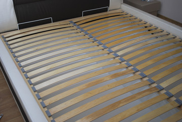 Slats under the mattress for the bed. Furniture.