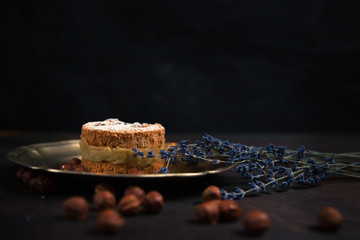 Fresh homemade cake on wooden background. Close up