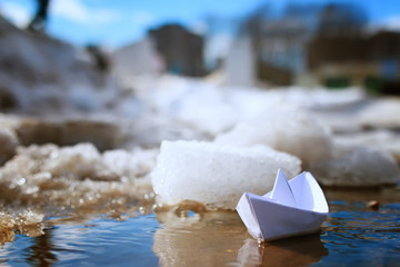 tinted photo paper boat on spring street