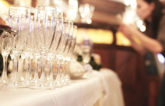 Wine glasses on the table served for the reception in the restau