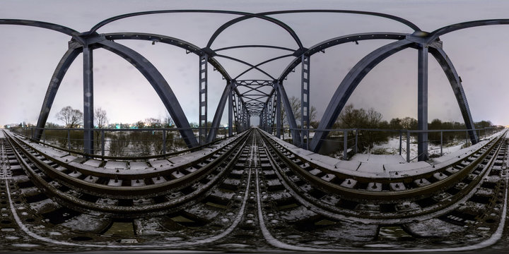 Full 360 degree equirectangula panorama night railway bridge
