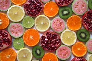 Mixed ripe and fresh fruits close up for background.