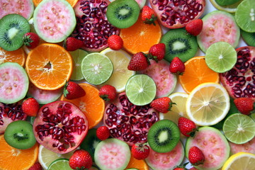Mixed ripe and fresh fruits close up for background.