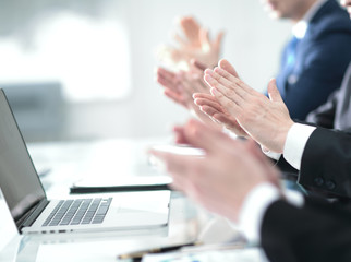 Male hands applauding after presentation of project at conferenc