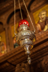 Orthodox chandelier with candle in church