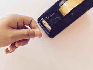 Tape holder with hand