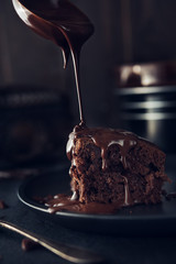 Chocolate cake on dark background - 136277155
