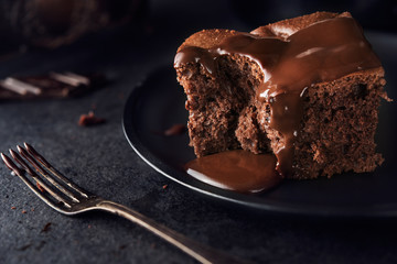 Chocolate cake on dark background