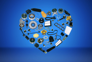 Heart spare auto parts for car on blue background. Set with many isolated items for shop or aftermarket, OEM