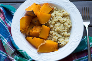 a dish of cooked pumpkin and quinoa