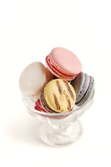 A cup of macaroons isolated on white background 