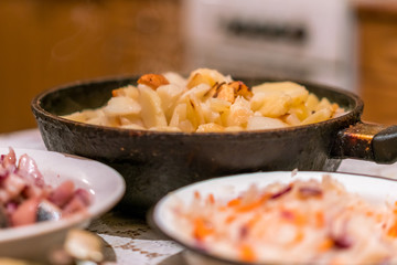 Country dinner with roast potatoes and coleslaw