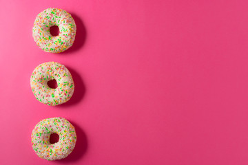 donuts on pink background