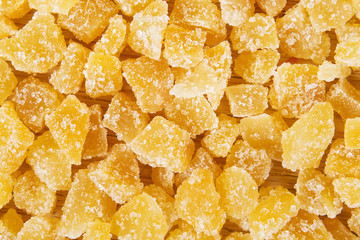Candied dried ginger golden close up background