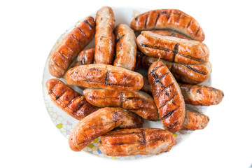 Sausages grill on a white background. Isolated