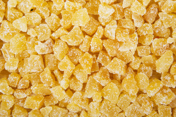 Candied dried ginger golden close up background