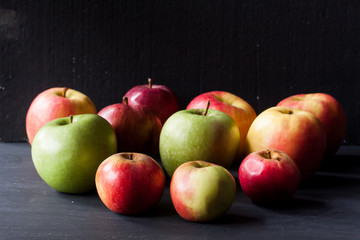apples on a black background