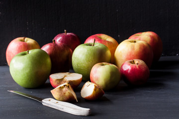 apples on a black background