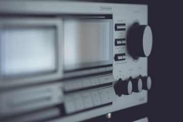 Fototapeta na wymiar Vintage audio stereo rack with cassette tape deck receiver.