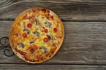 Close-up of a italian pizza on a plank