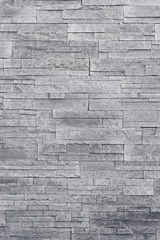 Grey stone veneer wall texture. Stone veneer tiles stacked flat make beautiful & modern accent walls in interior design. Use this gray texture as wallpaper, background, backdrop and more!