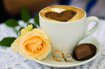 Wedding rings with coffee and candy