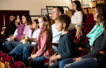 Audience attending movie night for comedy
