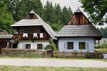 Fototapeta na wymiar Europe, country Slovakia. Museum of the Slovak village open air museum, in the city of Martin, region of Turiec. The old historical wooden houses in beautiful nature.