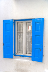 Traditional white houses at the narrow streets of Mykonos, Cycla