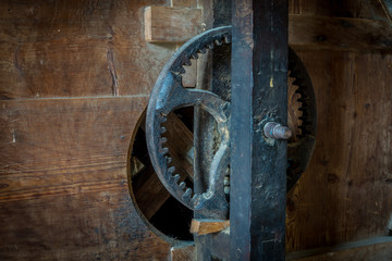 The pinion gear of an old mechanical device