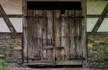 Wooden and old gate of the farmhouse
