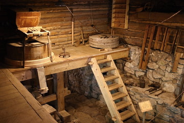 Inside water mill in Kvacianska dolina, Slovakia.  Historical Interior water mill, wood machine for grinding flour.