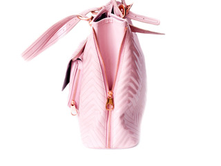 Luxury pink leather handbag isolated on white background