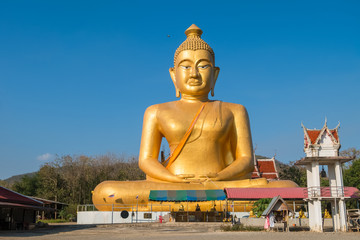 The huge golden Buddha at khao kiaw temple in ratchaburi Thailan